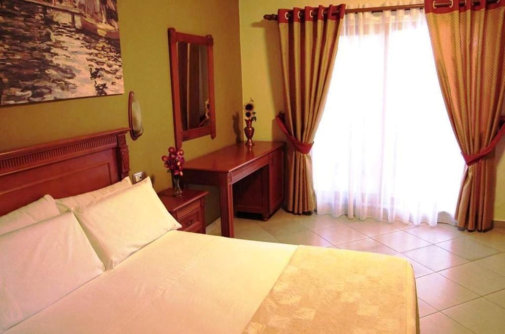 Hotel Millenium Tirana Szoba fotó
